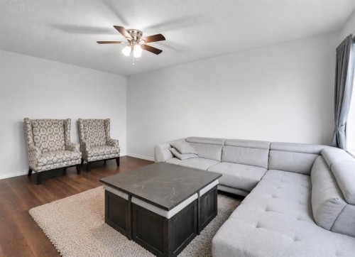 896 Rundlecairn Way Ne, Calgary, AB - Indoor Photo Showing Living Room