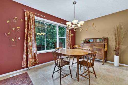 14 Evergreen Common Sw, Calgary, AB - Indoor Photo Showing Dining Room