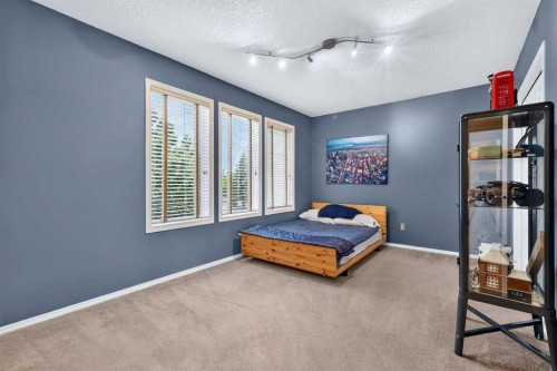 14 Evergreen Common Sw, Calgary, AB - Indoor Photo Showing Bedroom