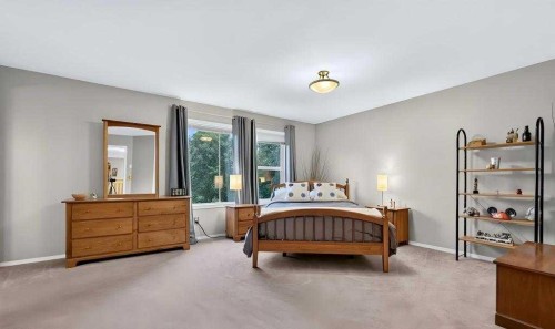 14 Evergreen Common Sw, Calgary, AB - Indoor Photo Showing Bedroom