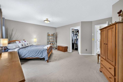 14 Evergreen Common Sw, Calgary, AB - Indoor Photo Showing Bedroom