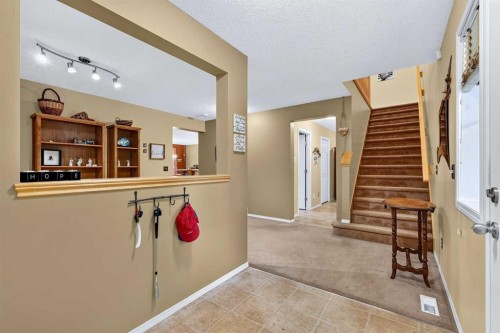 14 Evergreen Common Sw, Calgary, AB - Indoor Photo Showing Other Room