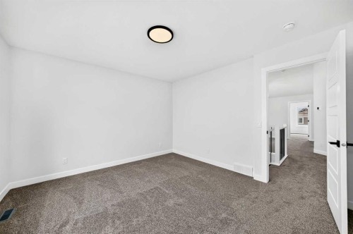 583 Buffaloberry Manor Se, Calgary, AB - Indoor Photo Showing Other Room