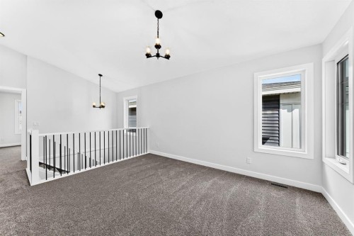 583 Buffaloberry Manor Se, Calgary, AB - Indoor Photo Showing Other Room