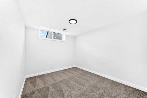 583 Buffaloberry Manor Se, Calgary, AB - Indoor Photo Showing Other Room