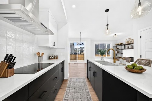 583 Buffaloberry Manor Se, Calgary, AB - Indoor Photo Showing Kitchen With Upgraded Kitchen