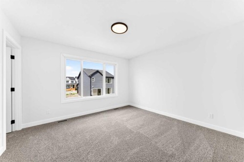 583 Buffaloberry Manor Se, Calgary, AB - Indoor Photo Showing Other Room