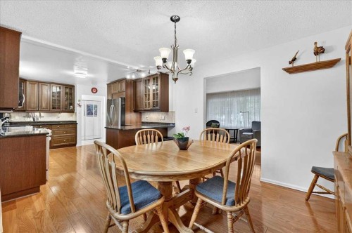1707 107 Avenue Sw, Calgary, AB - Indoor Photo Showing Dining Room
