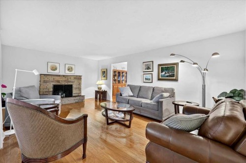 1707 107 Avenue Sw, Calgary, AB - Indoor Photo Showing Living Room With Fireplace