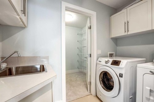 40 Westmore Place Sw, Calgary, AB - Indoor Photo Showing Laundry Room