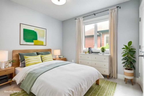 40 Westmore Place Sw, Calgary, AB - Indoor Photo Showing Bedroom