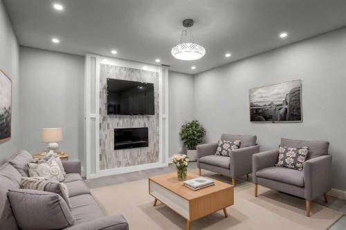40 Westmore Place Sw, Calgary, AB - Indoor Photo Showing Living Room With Fireplace
