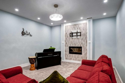 40 Westmore Place Sw, Calgary, AB - Indoor With Fireplace