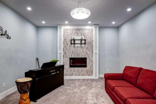 40 Westmore Place Sw, Calgary, AB - Indoor With Fireplace