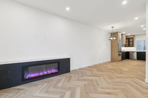 4303 30 Avenue Sw, Calgary, AB - Indoor Photo Showing Other Room With Fireplace