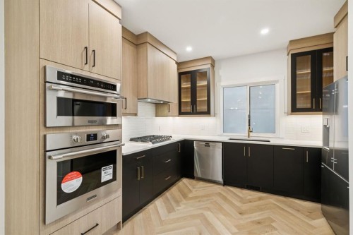 4303 30 Avenue Sw, Calgary, AB - Indoor Photo Showing Kitchen With Upgraded Kitchen