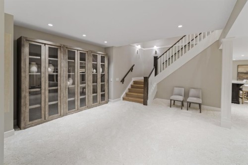 116 Hawk'S Landing Drive, Priddis Greens, AB - Indoor Photo Showing Other Room