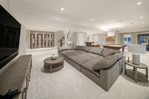 116 Hawk'S Landing Drive, Priddis Greens, AB - Indoor Photo Showing Living Room