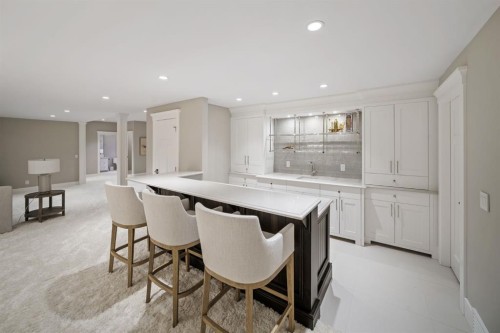 116 Hawk'S Landing Drive, Priddis Greens, AB - Indoor Photo Showing Other Room