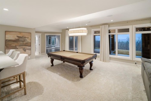 116 Hawk'S Landing Drive, Priddis Greens, AB - Indoor Photo Showing Other Room