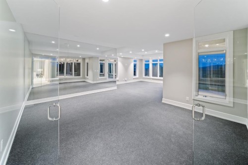 116 Hawk'S Landing Drive, Priddis Greens, AB - Indoor Photo Showing Other Room