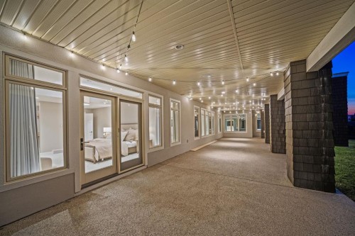 116 Hawk'S Landing Drive, Priddis Greens, AB - Indoor Photo Showing Other Room