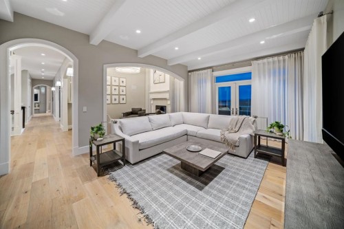 116 Hawk'S Landing Drive, Priddis Greens, AB - Indoor Photo Showing Living Room