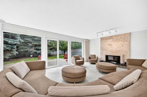 14224 Parkside Drive Se, Calgary, AB - Indoor Photo Showing Living Room With Fireplace