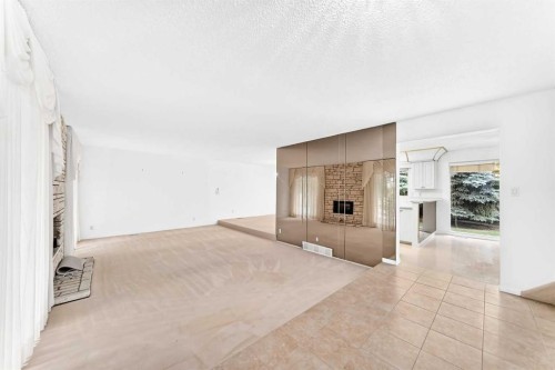 14224 Parkside Drive Se, Calgary, AB - Indoor Photo Showing Other Room With Fireplace