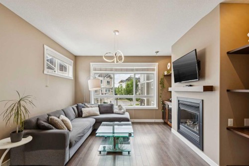 26 Skyview Ranch Gardens Ne, Calgary, AB - Indoor Photo Showing Living Room With Fireplace
