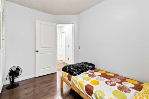 98 Panatella Hill Nw, Calgary, AB - Indoor Photo Showing Bedroom