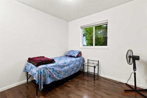 98 Panatella Hill Nw, Calgary, AB - Indoor Photo Showing Bedroom