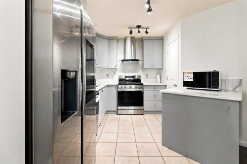 98 Panatella Hill Nw, Calgary, AB - Indoor Photo Showing Kitchen