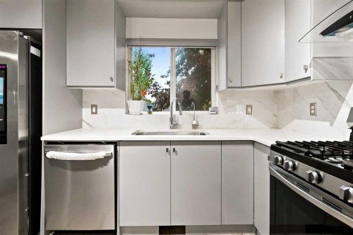 98 Panatella Hill Nw, Calgary, AB - Indoor Photo Showing Kitchen