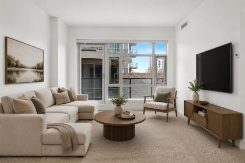 309-1410 1 Street Se, Calgary, AB - Indoor Photo Showing Living Room