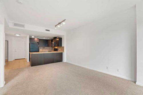 309-1410 1 Street Se, Calgary, AB - Indoor Photo Showing Kitchen