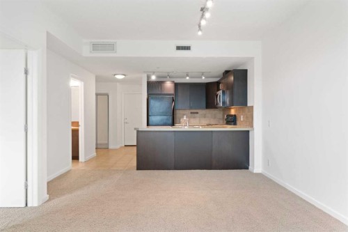 309-1410 1 Street Se, Calgary, AB - Indoor Photo Showing Kitchen