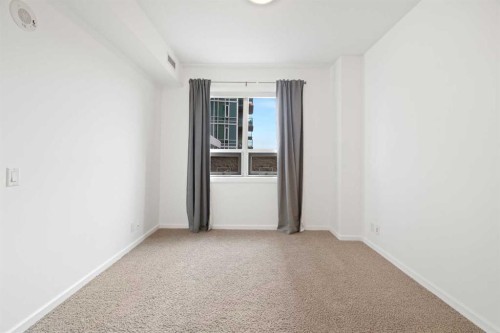 309-1410 1 Street Se, Calgary, AB - Indoor Photo Showing Other Room