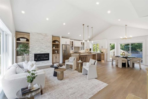 3375 Breton Close Nw, Calgary, AB - Indoor Photo Showing Living Room With Fireplace