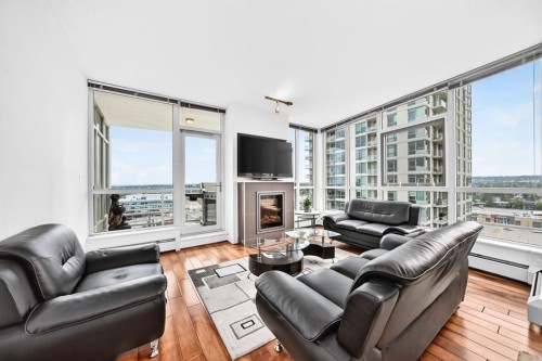 1405-99 Spruce Place Sw, Calgary, AB - Indoor Photo Showing Living Room With Fireplace