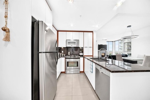 1405-99 Spruce Place Sw, Calgary, AB - Indoor Photo Showing Kitchen With Double Sink With Upgraded Kitchen