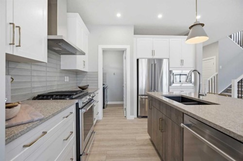 468 Dawson Circle, Chestermere, AB - Indoor Photo Showing Kitchen With Stainless Steel Kitchen With Double Sink With Upgraded Kitchen