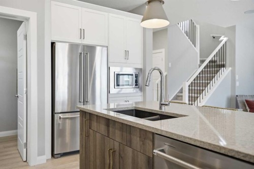 468 Dawson Circle, Chestermere, AB - Indoor Photo Showing Kitchen With Stainless Steel Kitchen With Double Sink With Upgraded Kitchen