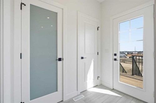 217 Bridgeport Gate, Chestermere, AB - Indoor Photo Showing Other Room