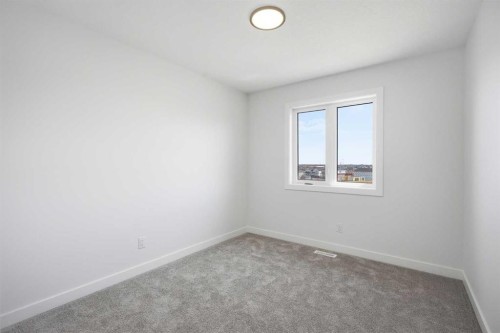 217 Bridgeport Gate, Chestermere, AB - Indoor Photo Showing Other Room