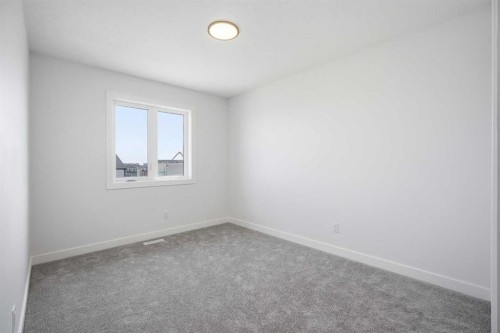 217 Bridgeport Gate, Chestermere, AB - Indoor Photo Showing Other Room