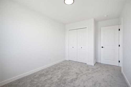 217 Bridgeport Gate, Chestermere, AB - Indoor Photo Showing Other Room
