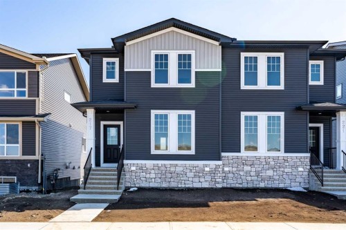 217 Bridgeport Gate, Chestermere, AB - Outdoor With Facade