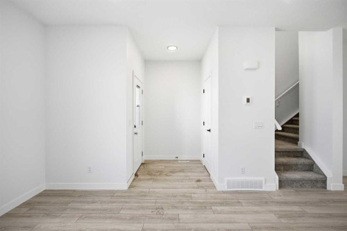 217 Bridgeport Gate, Chestermere, AB - Indoor Photo Showing Other Room
