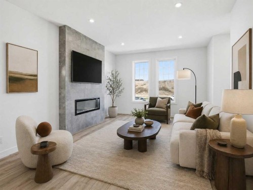 217 Bridgeport Gate, Chestermere, AB - Indoor Photo Showing Living Room With Fireplace
